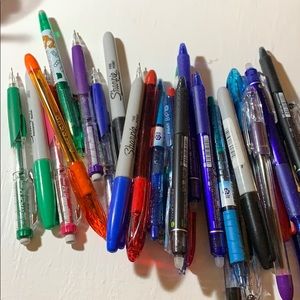 Lots of pens and highlighters, all barely used